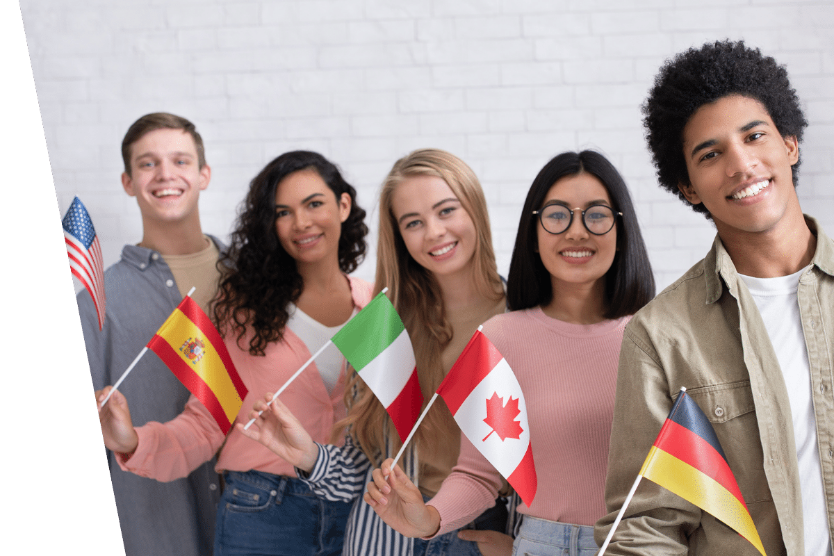 International students requiring student visa compliance holding their country flags