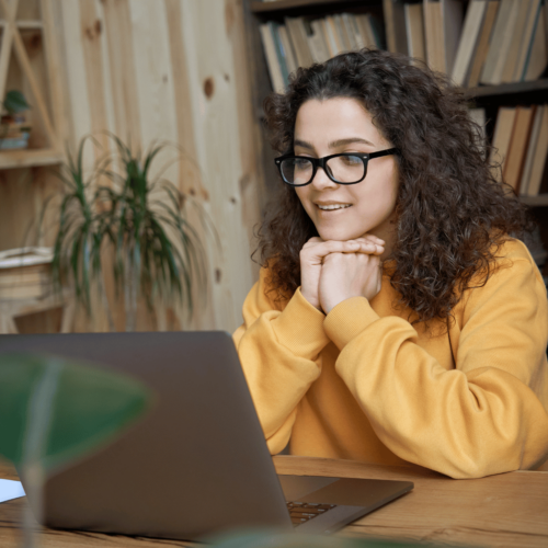 Student using laptop to participate in online learning