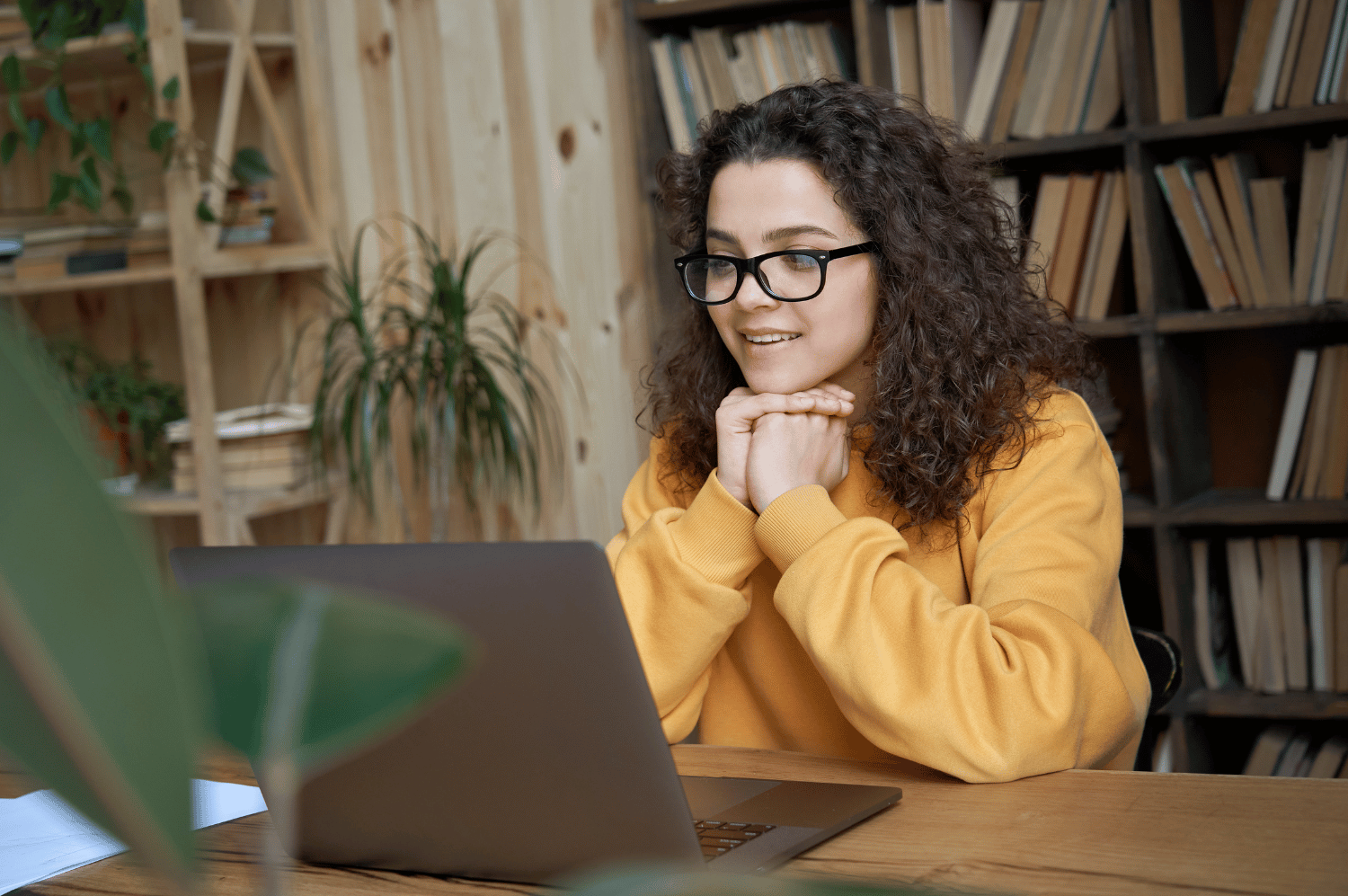 Student using laptop to participate in online learning