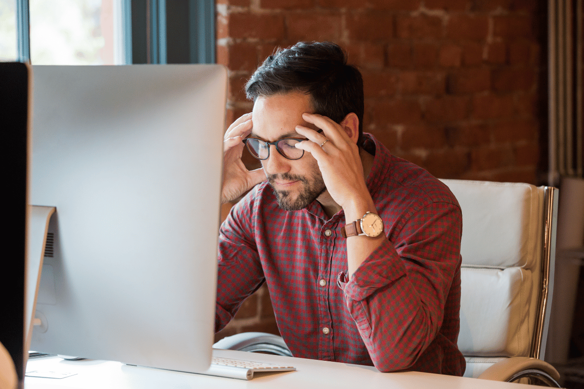 Stressed student administrator processing incomplete extenuating circumstances requests