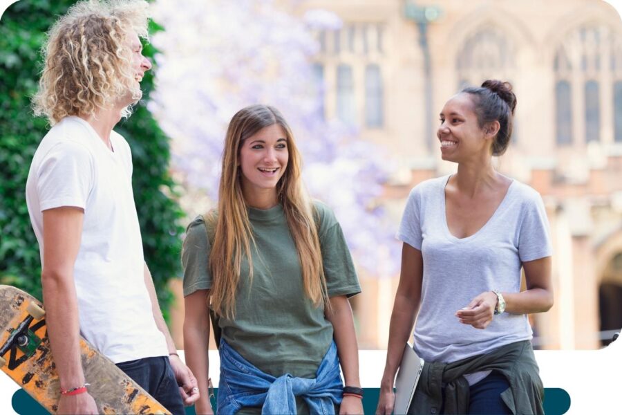 higher education students engaging with each other on campus